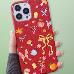 Iniciales de cinta de tetera roja rubí de lujo Funda personalizada iPhone 15 14 13 12 11 Pro Mini Max Plus Funda con nombre de regalo Funda de cuero con letras personalizadas