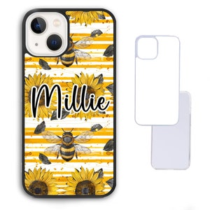 May include: A black phone case with a white and yellow striped background. The case features a pattern of sunflowers and bees. The name "Millie" is written in black cursive on the case.