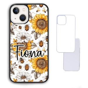 May include: Black iPhone case with a floral design featuring sunflowers, daisies, and bees. The name "Fiona" is written in a cursive font. A blank phone case is shown next to the decorated case.