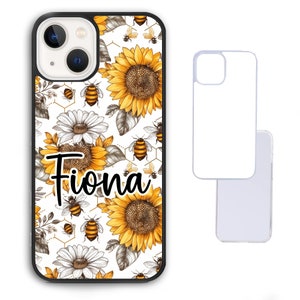 May include: Black iPhone case with a floral design featuring sunflowers, daisies, and bees. The name "Fiona" is written in a cursive font. A blank phone case is shown next to the decorated case.