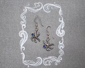 Jewelry for mermaid. Starfish earrings with blue gem apatite. Gift for her