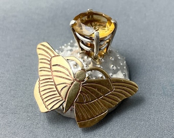 Sparkle and Spin: A Handmade Citrine and Brass Butterfly Pendant