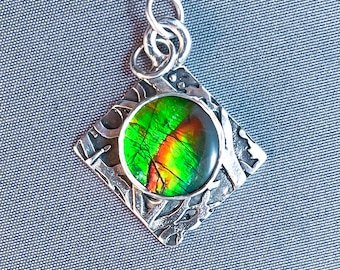 Splendor Unfolding: The Ammolite Leaf Pendant