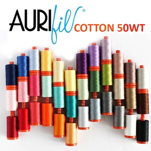 May include: A collection of 24 spools of Aurifil Cotton 50wt thread in various colors. The spools are arranged in a staggered pattern, with the orange bobbins facing forward.