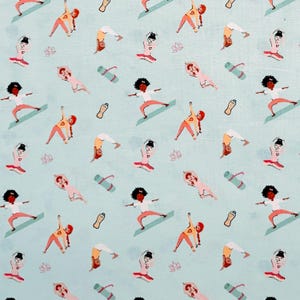 May include: A seamless pattern featuring a variety of women in different yoga poses on blue mats. The women are all wearing colorful workout clothes and have different hair styles. The background is a light blue color with pink lotus flowers and water bottles.