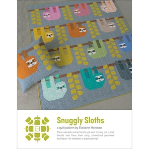 May include: A quilt and pillow set featuring colorful sloths hanging from branches. The sloths are in various colors, including pink, orange, yellow, and teal, against a light blue background. The text "Snuggly Sloths" is visible.
