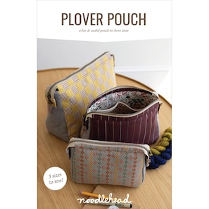 May include: Three fabric pouches in different sizes, with the text "PLOVER POUCH" and "3 sizes to sew!". The pouches have various patterns, including a yellow and white checkered design, a burgundy striped pattern, and a gray and orange geometric pattern.