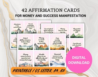 May include: 42 printable affirmation cards for money and success manifestation. The cards feature watercolor mountain scenes with pink and green backgrounds. The text on the cards includes affirmations such as "Abundance is my natural state" and "Money loves to come my way."