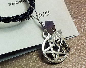 Pentacle and crystal necklace with history and description card.