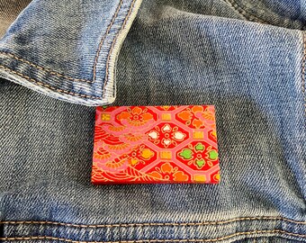 Unique Japanese Chiyogami washi pin brooch.  Handmade. Intricate red and pink with gold detail. Free shipping ready to ship