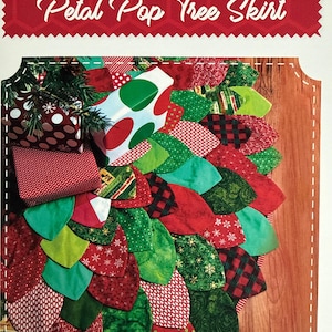 May include: A colorful Christmas tree skirt with a petal design. The skirt features a variety of fabrics in red, green, and white, with patterns including polka dots, snowflakes, and plaid. The text "Petal Pop Tree Skirt" is displayed at the top.
