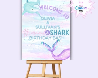 Op de afbeelding: Welkom bij Olivia & Sullivan's Mermaid & Shark Birthday Bash bord met een blauwe haai en een paarse zeemeerminstaart op een aquarel achtergrond.