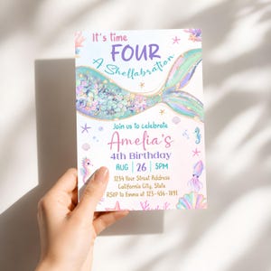 May include: A rectangular birthday invitation card featuring a mermaid tail illustration with iridescent scales, pastel sea creatures, and gold accents. The text reads: It's time FOUR A Shellabration, Join us to celebrate Amelia's 4th Birthday, AUG 26, 5PM.