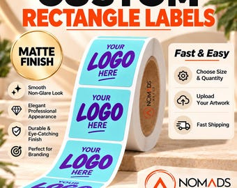 May include: A roll of light blue rectangular labels featuring the purple text YOUR LOGO HERE. The labels have a matte finish. Text on the image includes CUSTOM RECTANGLE LABELS, MATTE FINISH, Fast & Easy, Choose Size & Quantity, Upload Your Artwork, Fast Shipping, and NOMADS LABELS.