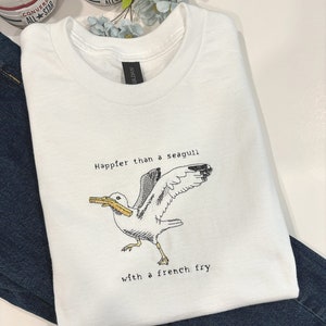 Happier Than A Seagull With A French Fry Embroidered T-Shirt | Seagull Fries T-Shirt | French Fries Shirt | Cute T-Shirt | Nature Lover Gift