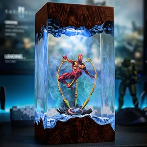 May include: A set of three ceramic mugs with a speckled, matte finish. The mugs are in shades of cream, light gray, and dark gray. Each mug has a simple, minimalist design and a rounded handle.