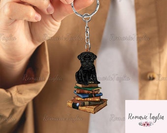 Llavero Pug negro sentado en el libro, llavero acrílico Pug, llavero de coche para perros Pug, regalo para amantes de Pug, llavero seguro para conducir