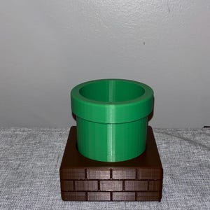 STL file - Mario Warp Pipe and Brick Pencil Holder