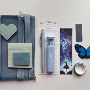 May include: A blue mesh pencil case with a zipper, a heart-shaped sticker, a notepad, a pen, a blue highlighter, a reading list notepad, a blue bookmark with a galaxy design, a blue butterfly sticker, and a roll of washi tape.