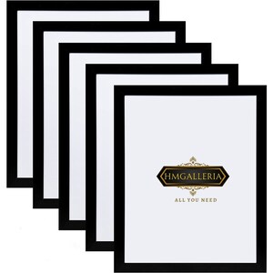 May include: Set of five black picture frames with a white mount. The frames are stacked on top of each other. The bottom frame has the text "HMGALLERIA ALL YOU NEED" in gold lettering.
