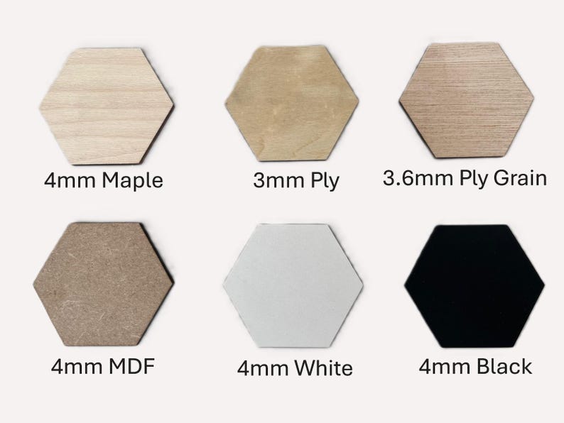 May include: Six hexagonal wood shapes in different colors and materials. The shapes are labeled with their thickness and material: 4mm Maple, 3mm Ply, 3.6mm Ply Grain, 4mm MDF, 4mm White, and 4mm Black.