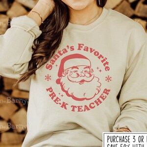 Santas Favorite Pre K Teacher Pajamas Xmas Pre-K Costume T-Shirt Santas Favorite Pre K Teacher Pajamas Xmas Pre-K Costume T-Shirt