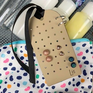 Organizer portatile per orecchini a bottone e a cerchio