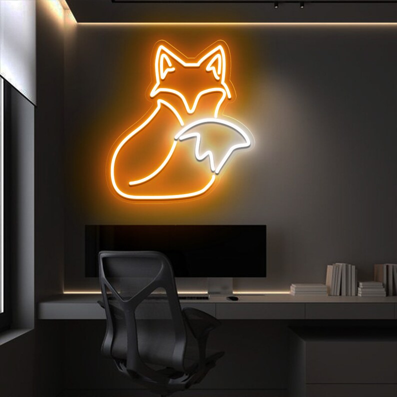 May include: A neon sign shaped like a fox with a curled tail. The sign is lit up in a warm orange color and is mounted on a dark wall.