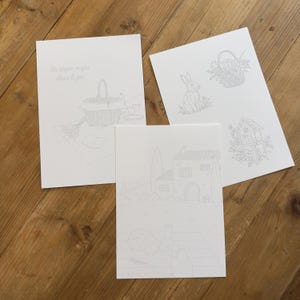 Illustrations botaniques à l’aquarelle inspirées du printemps, comprenant six visuels délicats : 3 éléments (un panier fleuris, un lapin, une maison à oiseau), une table de campagne, un ensemble de petits éléments, un cadre vintage avec une poule, un panier de pique-nique. Style maison de campagne, doux et authentique. Idéal pour décoration murale, papeterie ou impression. Créations artisanales, parfaites pour une ambiance rustique et chaleureuse. Papier 300g spécial aquarelle