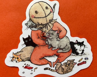 May include: A sticker featuring a character in an orange costume with a burlap sack mask, surrounded by cats. The character holds a lollipop, and several cats are interacting with candy. The sticker has a white border and is set against an orange background.
