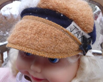 Toddler sized Jax Hat in Gold blue and white sweater fabrics