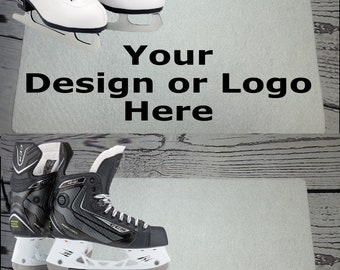 May include: Two rectangular light gray mats featuring the black text Your Design or Logo Here. The top mat displays a pair of white figure skates with white laces. The bottom mat displays a pair of black and gray ice hockey skates.