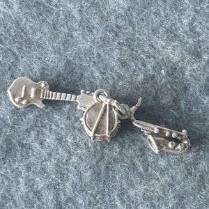 Vintage Sterling Silver 925 Charm Pendant. Trio of Musical Instruments Saxophone, Drum, Electric Guitar.
