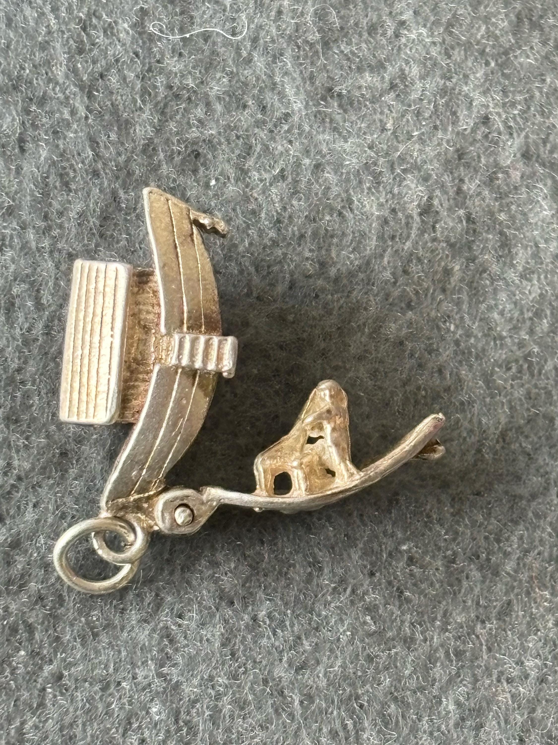 Vintage Sterling Silver 925 Charm Pendant. Opening Noah's Ark. Opens to reveal Noah tending to a Giraffe and cattle.