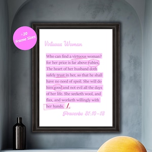 May include: A printable wall art design featuring a quote from Proverbs 31:10-18 about a virtuous woman. The text is in a pink font against a white background and framed in a black frame.