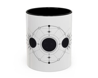 Taza de cerámica con fases lunares en blanco y negro