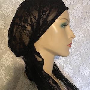 Slip-on black lace chemo headwrap, stylish and comfortable.