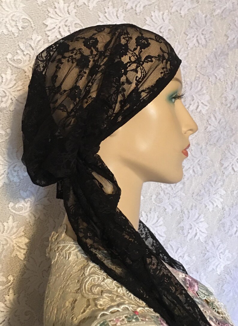 Fashionable scarf for women in black lace. Stylish slip-on scarf for modesty or hair loss.