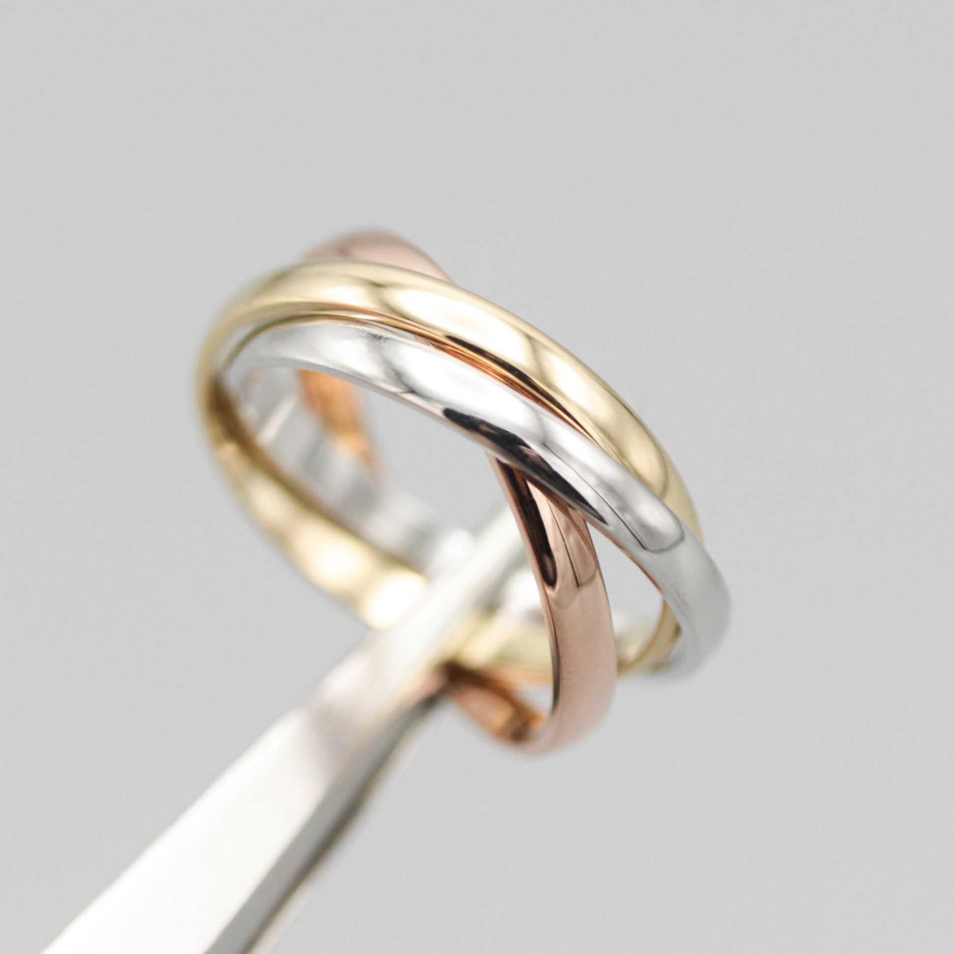 Gold trinity ring new arrivals