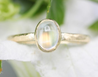 Rainbow Moonstone ring in bezel setting with 18k gold texture band