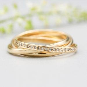 Trio Rolling Ring 18k gold band with diamonds