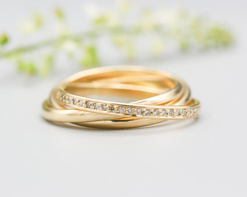 Trio Rolling Ring 18k gold band with diamonds image 1