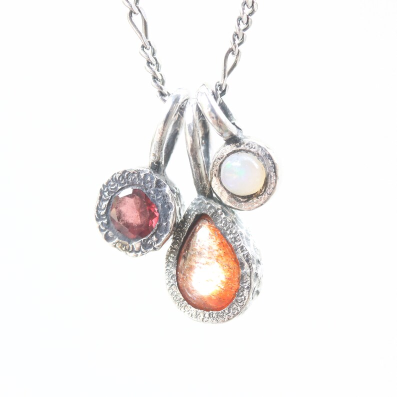 Three princess necklace,sunstone,garnet,opal gemstone pendant in silver bezel setting