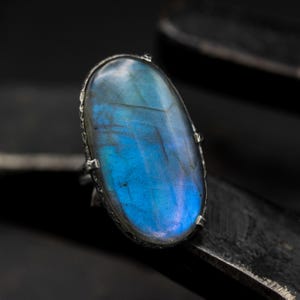 Large oval natural Labradorite cocktail ring with sterling silver band