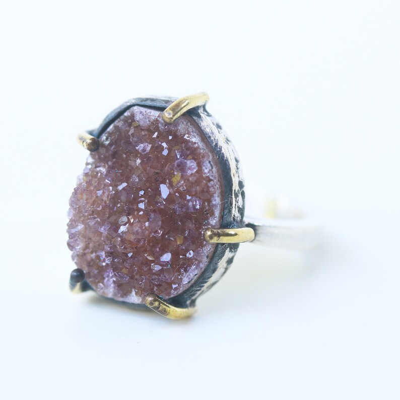 Sterling silver ring with tiny Druzy quartz in silver bezel and brass prongs setting