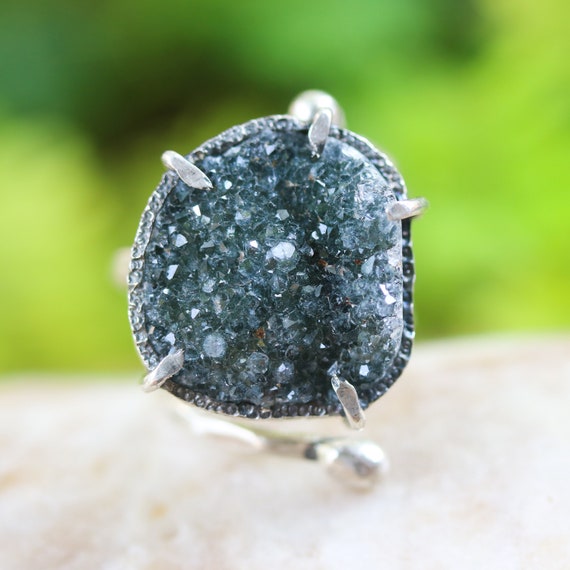 Sterling silver ring with tiny Druzy quartz in silver bezel and brass prongs setting