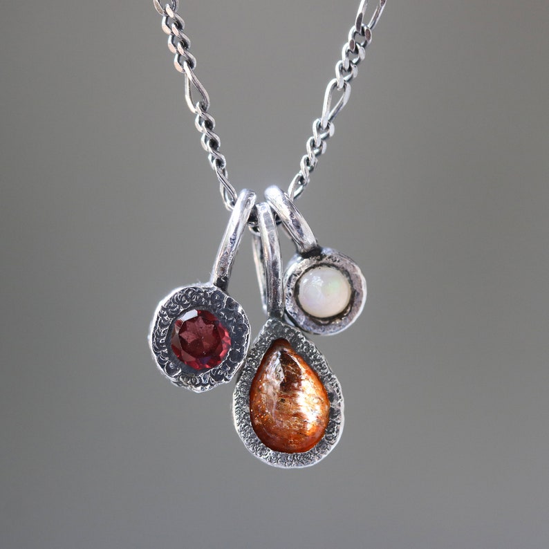 Three princess necklace,sunstone,garnet,opal gemstone pendant in silver bezel setting