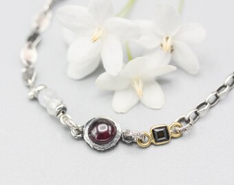 Garnet pendant bracelet with dark green tourmaline and moonstone on sterling silver chain