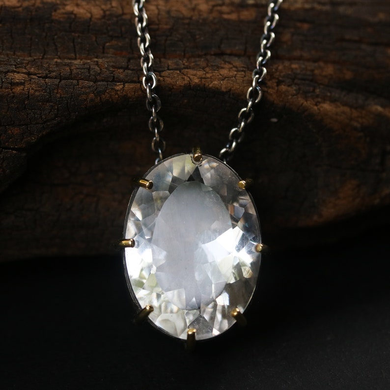 Oval faceted white topaz necklace in silver bezel and prongs setting with silver beads secondary on oxidized silver chain