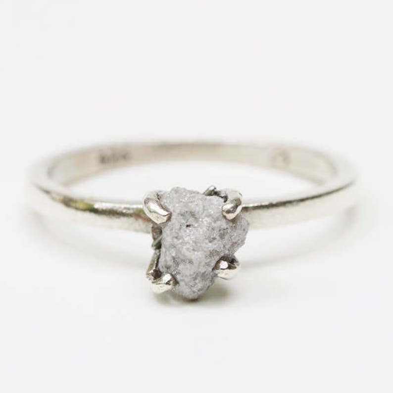 Sterling silver in high polished band ring with white grey raw rough diamond in prongs setting